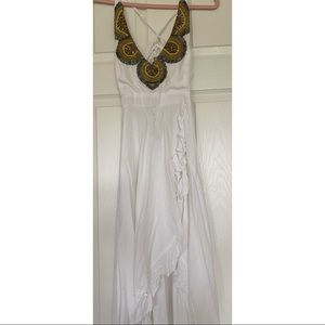 Beautiful white dress with handmade embroidery.